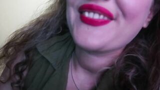 Adorable Woman Paints Her Lips Red And Smokes A Cigarette