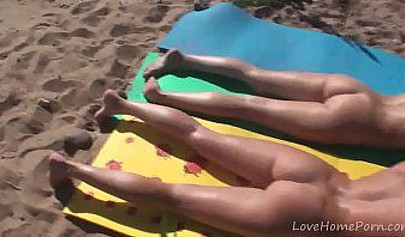 Outdoor Lesbian Foursome On A Nude Beach Under The Sun