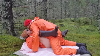 Sex In Orange Rainwear In The Woods