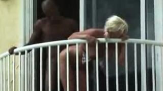 Interracial Couple Fucking On The Balcony