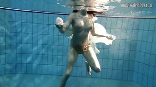 Dark Haired Teen Andrea In The Pool