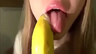 Cute Girl Sucking A Banana With Condom