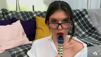 Teen In Glasses Masturbates With Glass Dildo